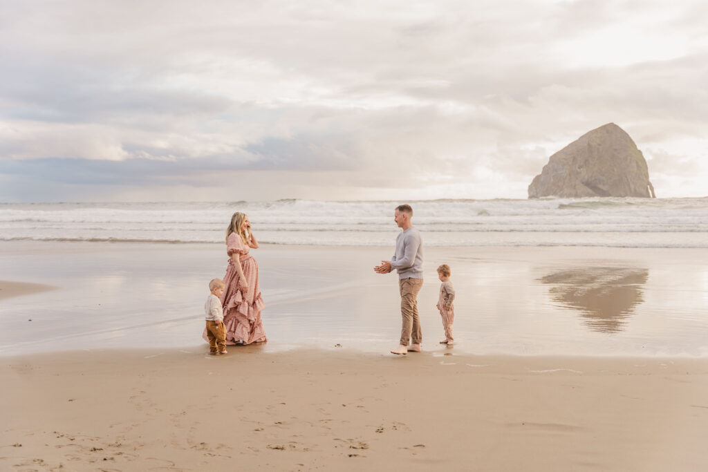 family walking along the beach during an Oregon Coast family photography session