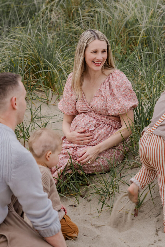 Fall family beach photos on the Oregon Coast - cozy sweaters and bare feet in the sand.